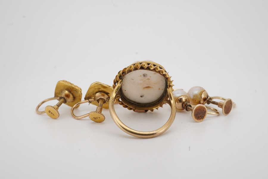 Two pairs of 9ct ear clips including cultured pearl, a 9ct 'Baby' brooch, a 9ct and cameo set ring and a yellow metal pendant, gross weight 14.6 grams. Condition - poor to fair